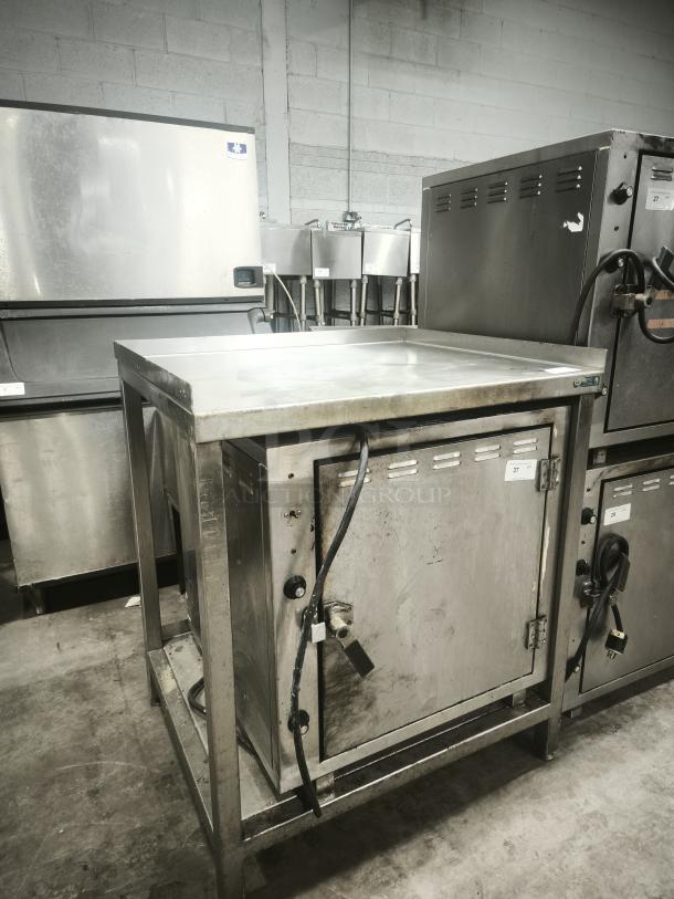 ROK RCI-P650E high temperature stone oven, sturdy build, stainless steel, visible wear, for lab or industrial use, 450°F max.