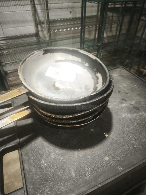 Stainless Clad Frying Pan, 12 inch, stack of three, visible wear and tarnish, label marked "77".