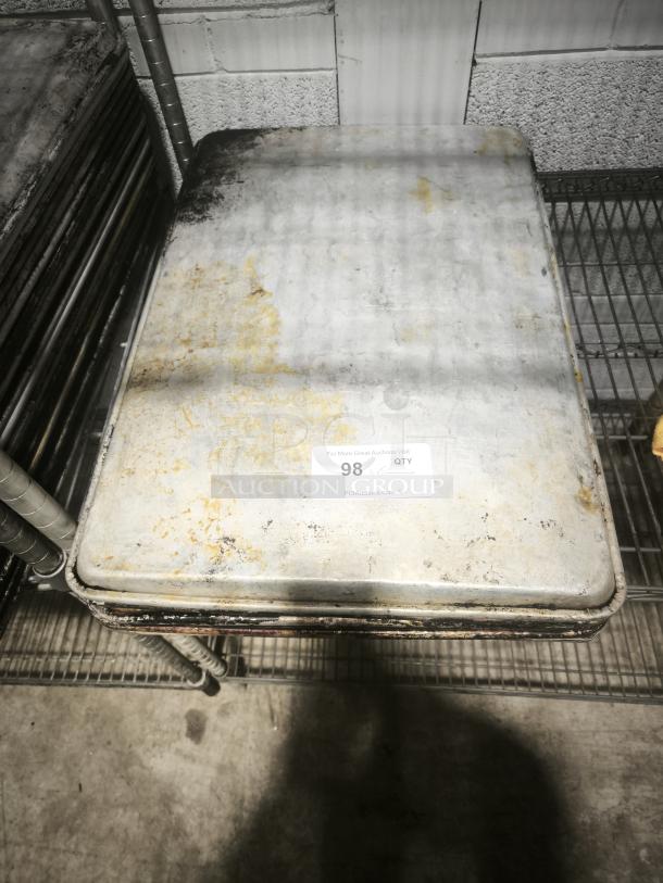 Aluminum cake baking pan, rectangular, used condition with surface wear. Auction label reads "98" with PCAuctions.com URL.