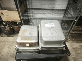 Stack of stainless steel steam table pans, half full size, 4" deep, slight wear, labeled "111 QTY" on top pan.