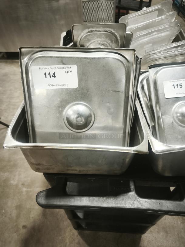 Stainless steel steam table pan with slotted lid, 1/2 full size, in used condition. Label indicates auction number 114.