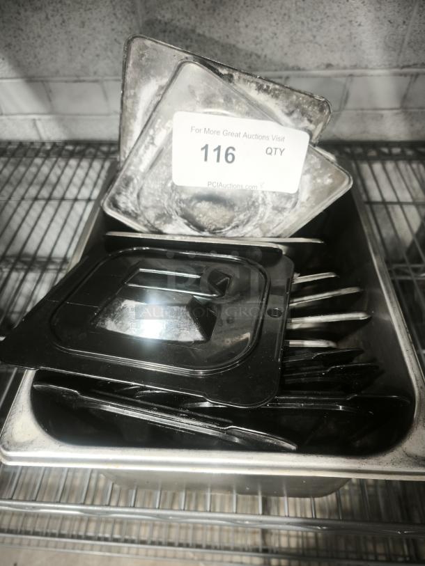 Slotted lid and 1/4 full-size table pan, metallic finish, used condition, auction tag with number 116 visible.
