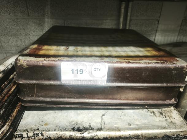 Stainless steel cooking pan, 16-inch, used condition with visible wear and rust. Auction tag reads "119 x4 QTY".