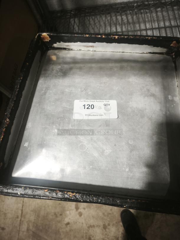 Stainless steel cooking pan, 16-inch, square shape, visible wear and rust on edges, auction tag with quantity information.