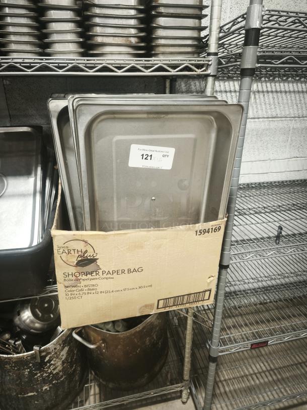 Stainless chafing dish with foldable frame, cover lid, and 2 fuel holders, in good condition. Visible label: "121 QTY."