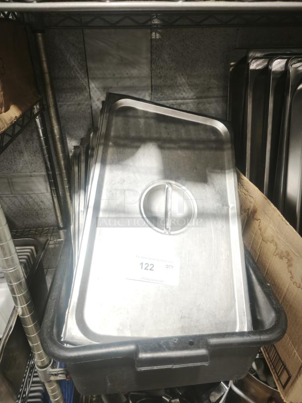 Stainless steel full-size pan cover lid, features a handle. Tag reads "122 QTY." Good condition, light wear visible.