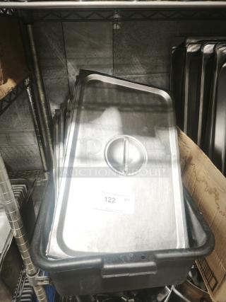 Stainless steel full-size pan cover lid, features a handle. Tag reads "122 QTY." Good condition, light wear visible.
