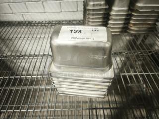 1/9 size, 4" deep food pan stack on wire rack. Silver metal, good condition, labeled "128" for auction identification.