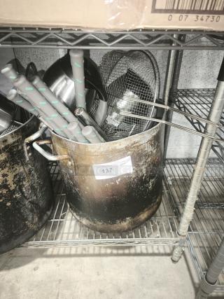 Large metal pan with handles, well-worn condition. Contains utensils. Label reads "137 QTY" for auction identification.