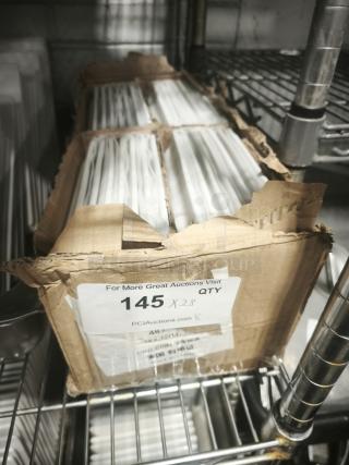 Rectangular bright white square porcelain plates in original box, quantity 28, in good condition. Box marked "145 Qty."