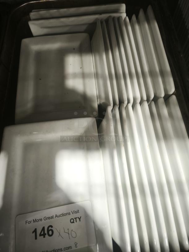 Rectangular bright white porcelain plates, stacked, with label showing quantity of 40. Clean, modern design.