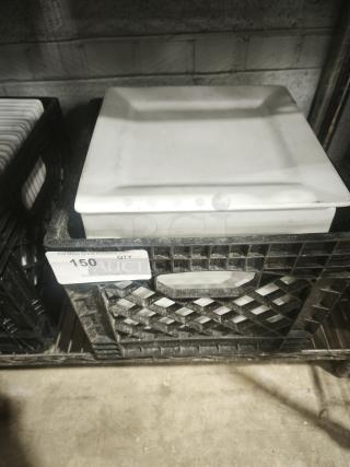 10 bright white square porcelain plates stacked in a crate; pristine condition, suitable for dining or display.