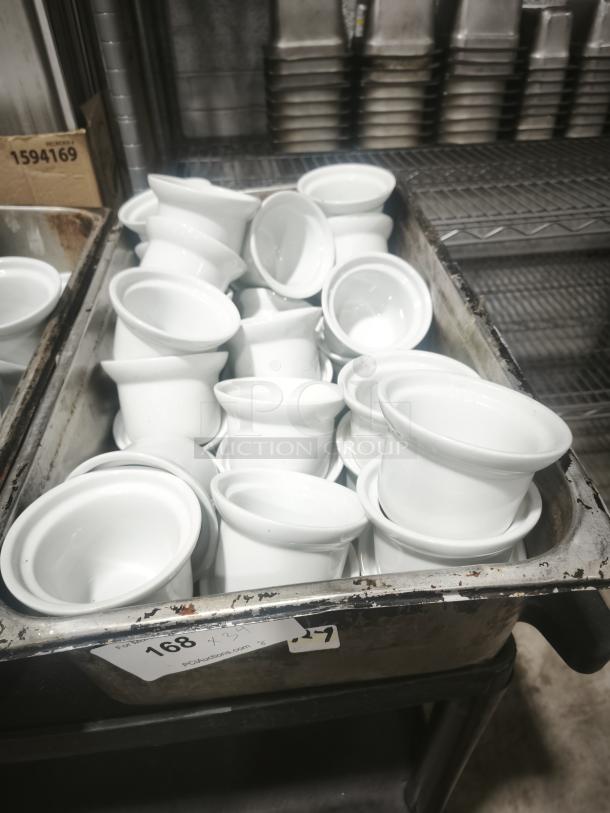 Aluma White Medium Porcelain Pot Pie Dishes; several stacked in metal tray, glossy finish, auction labels visible.