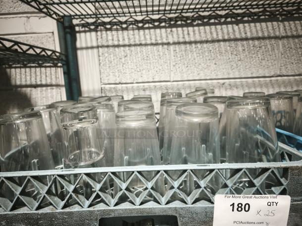 Vintage restaurant glass tumblers in a crate, set of 25. Clear glass, gently used condition. Tags indicate quantity.