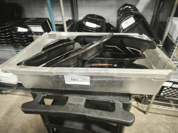 Black Rock Bar and Grill hot stone serving platters in a plastic tub, used condition, item tag marked "191".