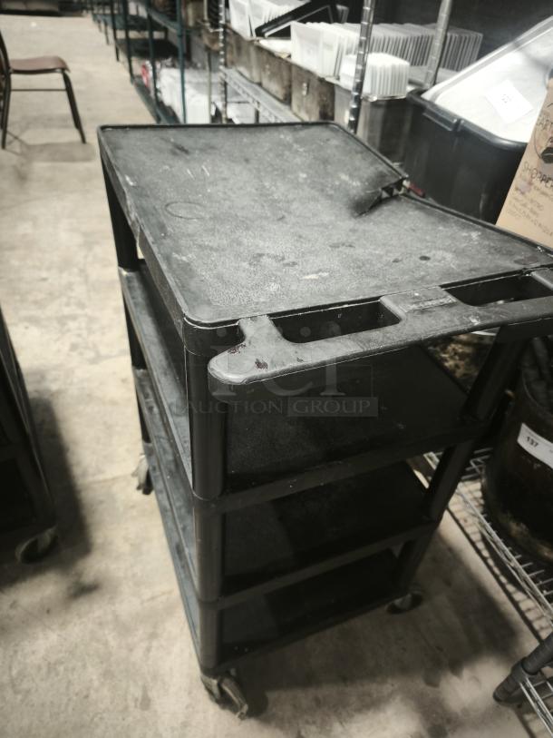 Offex Endura 4 Shelf Black Presentation Cart, 35 1/4" H, used condition, scuff marks, durable plastic, rolling wheels.