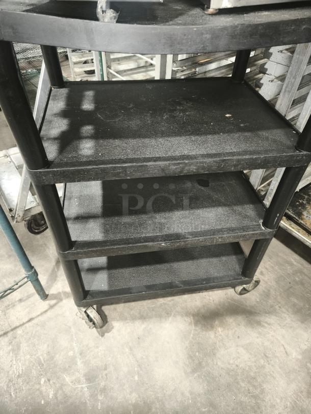 Offex Endura 4 Shelf Black Presentation Cart, 35 1/4"H, used condition, sturdy, durable, with caster wheels for mobility.