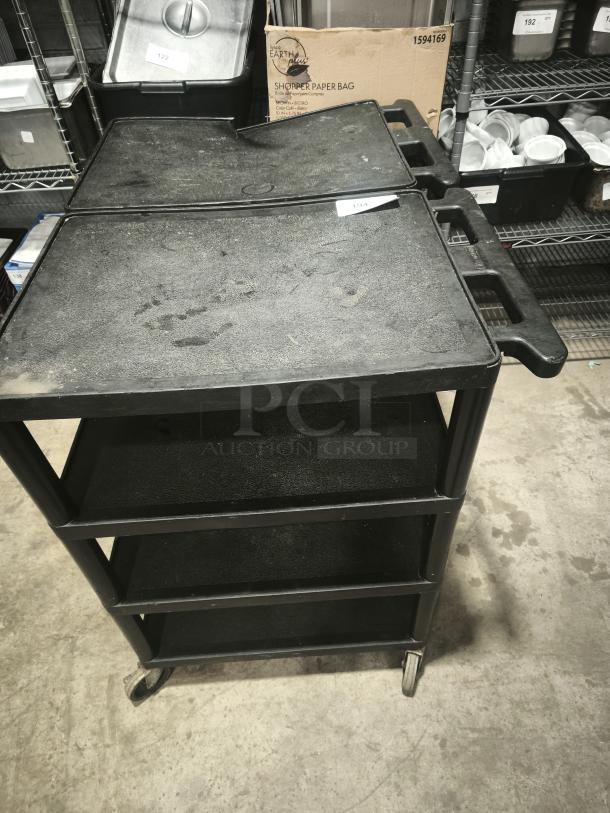 Offex Endura 4 Shelf Black Presentation Cart, 35 1/4"H, sturdy, with visible scratches, on wheels for mobility.