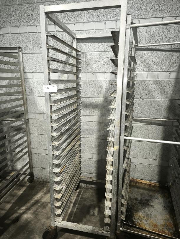Aluminum bakers rack with multiple shelves, used condition. Labeled with "199". No cover shown.