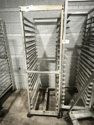 Aluminum bakers rack with multiple shelves, showing signs of wear and rust. Labels "199" and "200" indicate quantity.