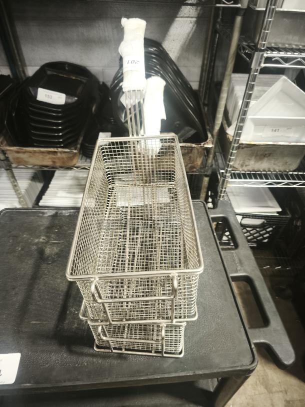 Brand new commercial wired mesh fry basket with front hook and black non-slip grip handle, item tag number 201.
