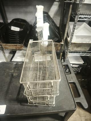 Brand new commercial wired mesh fry basket with front hook and black non-slip grip handle, item tag number 201.