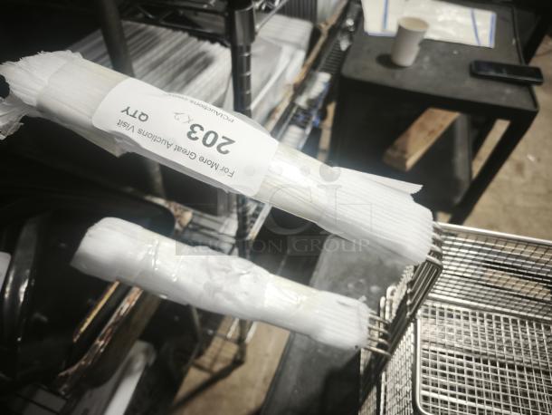 Brand new commercial wired mesh fry basket with front hook, black non-slip grip handle, labeled as item 203.