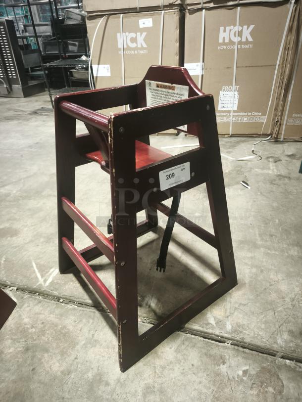 CHH-103 wood high chair, 29 3/4" tall, stackable, waist strap, visible wear on edges, safety warning label attached.