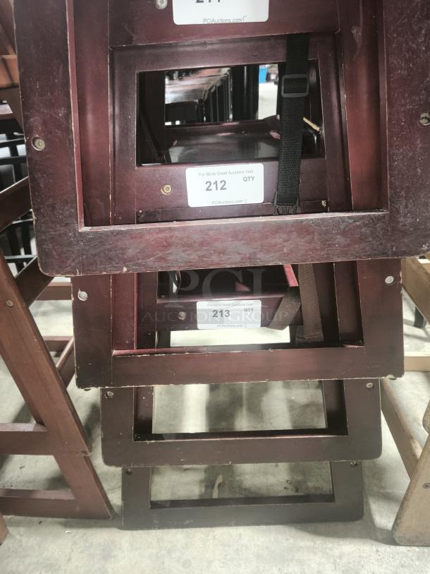 Stackable wood high chair, model CHH-103, with waist strap. Measures 29 3/4". Visible auction labels indicating quantity.