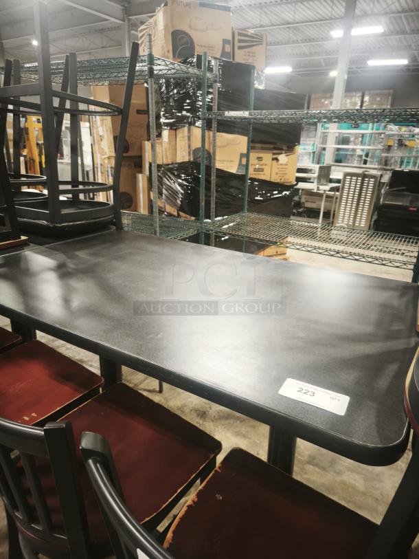 Premier Café Height Table, black surface, metal frame, good condition, auction tag with quantity "223" visible.