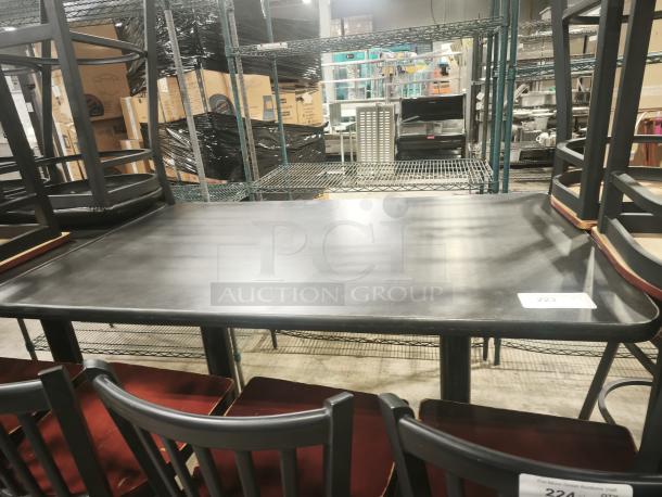 Premier Café Height Table in black, rectangular shape, used condition. Auction label "223" visible on tabletop.