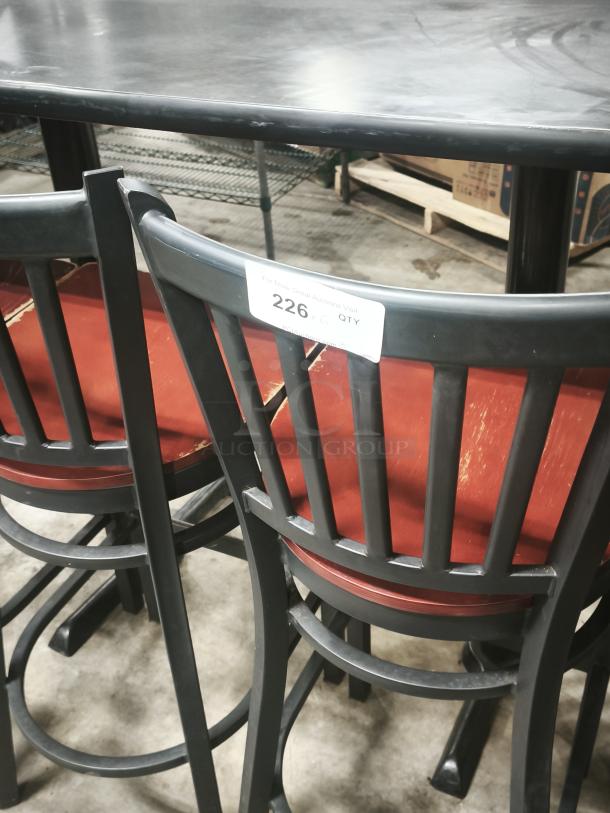 Black metal dining chair with schoolhouse back design, mahogany wood seat. Tag shows "226 QTY." In used condition.