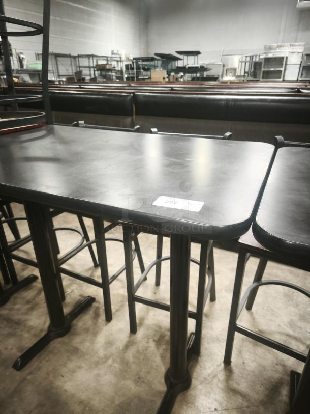 Premier Café Height Tables with black surfaces and sturdy metal legs. Item tag showing "227". Used condition.