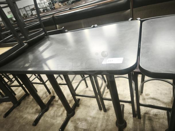 Premier Café Height Tables, black finish, sturdy metal legs, used condition, labeled "231," ideal for commercial settings.