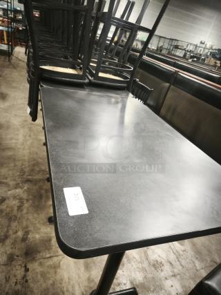 Premier Café height table with sturdy black surface and metal frame. Minimal wear. Label shows "235 QT."