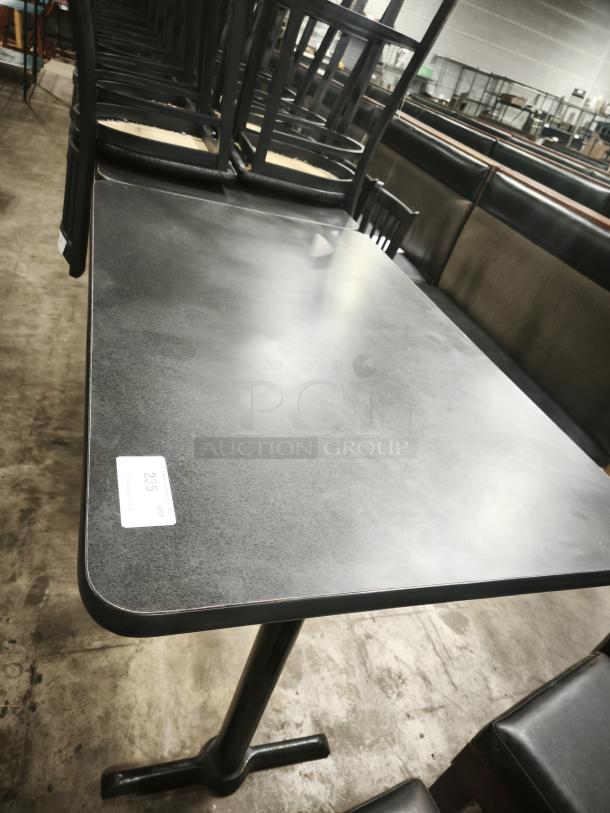 Premier Café Height Table, black surface, sturdy metal pedestal base, excellent condition, auction tag shows "Qty 235".