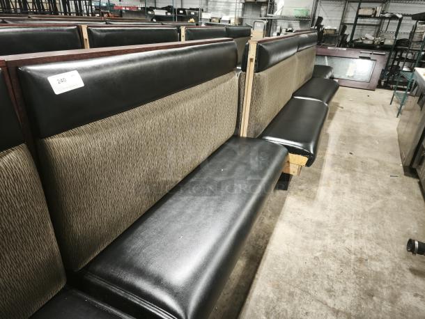 Mid-channeled restaurant booth with headroll, black vinyl, textured fabric back, good condition, auction lot label 240.
