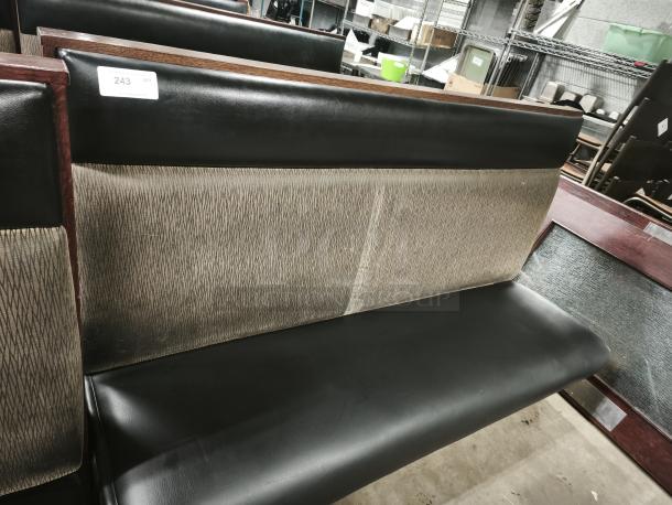 Mid-channeled style restaurant booth with headroll, black seat and patterned backrest, label tagged with "243".