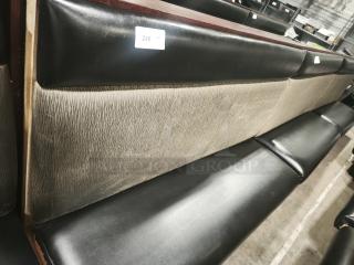Single mid-channeled style restaurant booth with headroll, black and tan upholstery, labeled with "246", gently used condition.