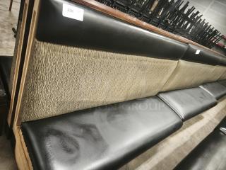 Single mid-channeled style restaurant booth with headroll, features black leather seat, patterned fabric backrest. Tag: "259".