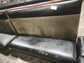 Single mid-channeled style restaurant booth with headroll, black faux leather and patterned fabric, shows slight wear, tag marked "260 QTY".