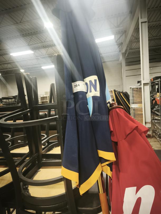 Blue and red patio beer umbrella for bar or restaurant, featuring logo, minor wear. Auction label indicates item number 264.