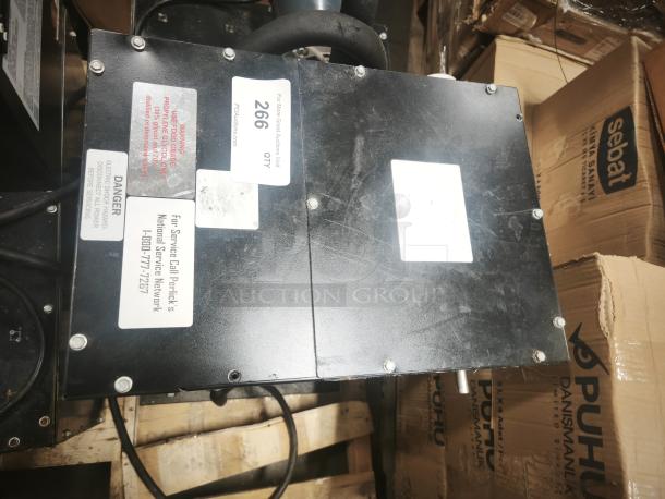 Perlick 4414 Draft Beer System Power Pack with air cooling, black casing, visible warning labels, and contact info label.