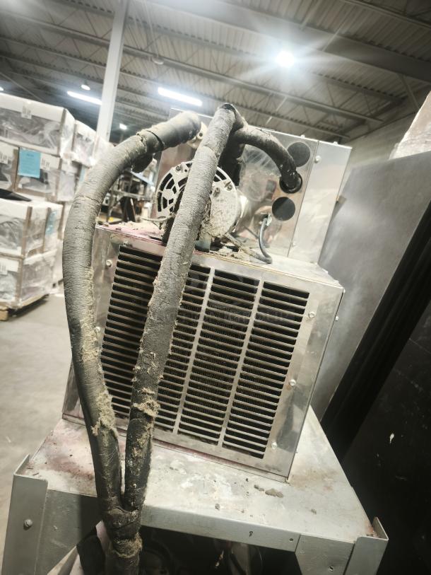 Perlick 4414 draft beer system power pack with air-cooled design and one pump. Visible wear and dirt on exterior.