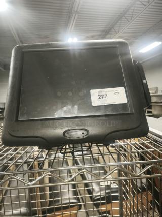 Radiant Systems POS display monitor on metal rack, used condition, visible auction label "277 QTY."