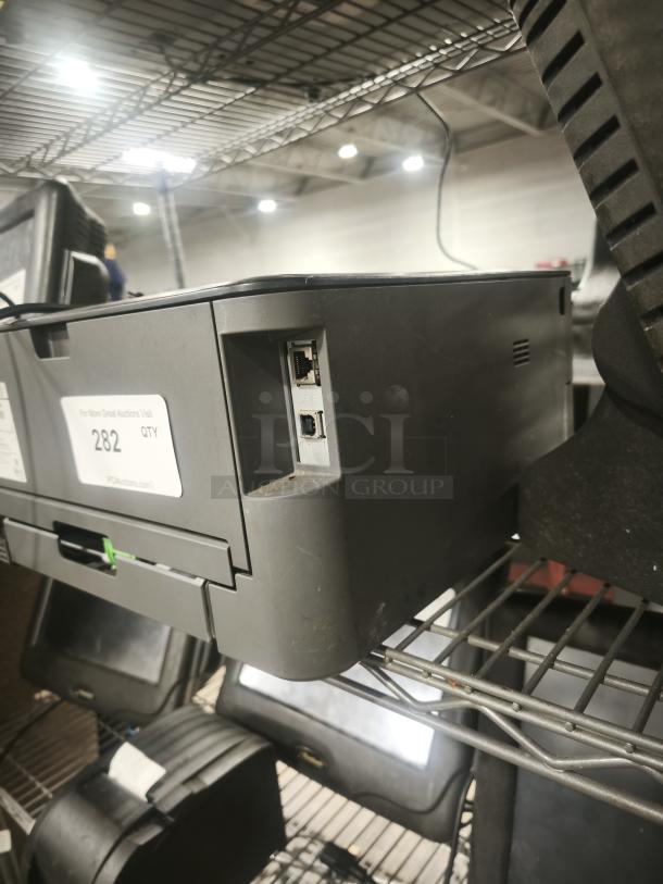 Brother HL-L2340DW Monochrome Laser Printer, showing rear ports and condition. Auction label: Lot 282. Some wear visible.