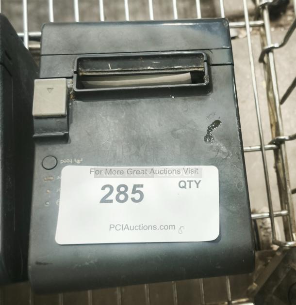 Epson thermal receipt printer for POS systems, black, used condition, visible feed slot, auction tag showing "285".