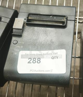Epson thermal receipt printer for POS, used condition, labeled "288" from PCIAuctions.com, on metal shelf.