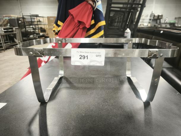 TrueCraftware 8 Qt. stainless steel folding stand for chafing dish, ideal for catering events. Sturdy frame, new condition.