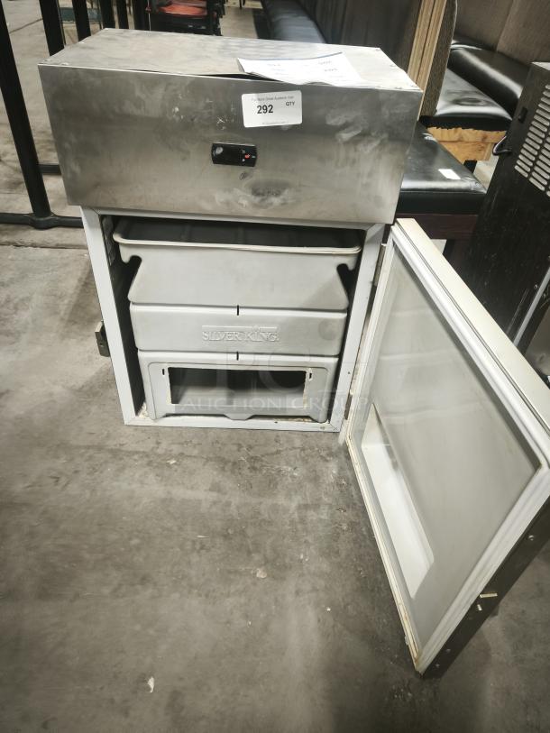 Silver King SKDL25-ESUS2 refrigerated lettuce crisper, stainless steel, open door, interior trays visible, auction label attached.